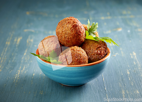 Image of bowl of fried falafel balls