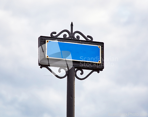 Image of old metal signpost