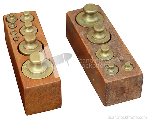 Image of Set old vintage brass weights in wooden box isolated on white ba