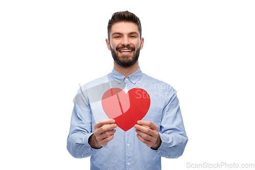 Image of happy smiling young man with red heart