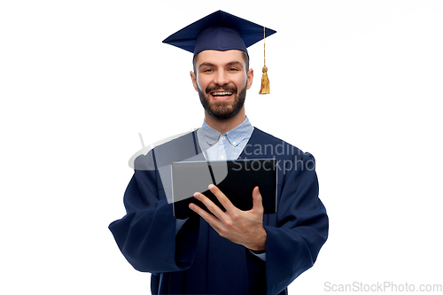 Image of male graduate student or bachelor with tablet pc