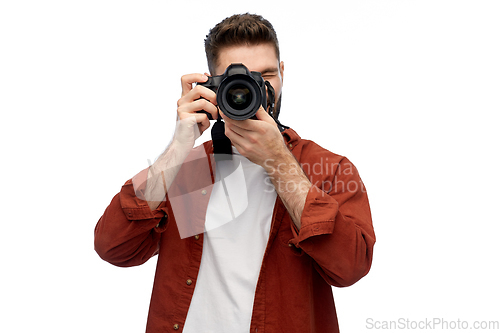 Image of smiling man or photographer with digital camera