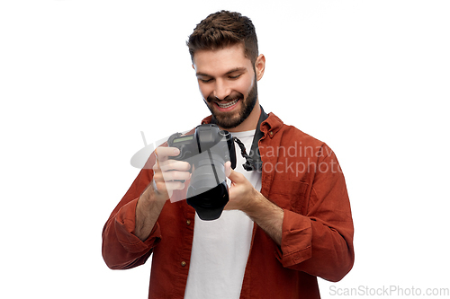Image of smiling man or photographer with digital camera