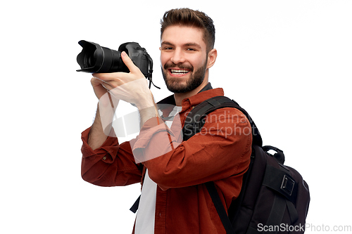 Image of happy man or photographer with camera and backpack