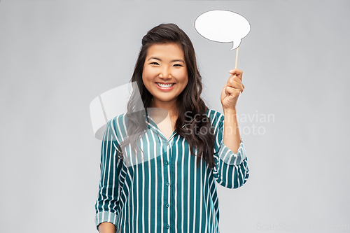 Image of happy asian woman holding speech bubble