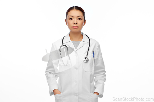 Image of asian female doctor in white coat with stethoscope