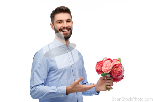 Image of happy smiling man with bunch of flowers