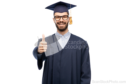 Image of happy male graduate student showing thumbs up