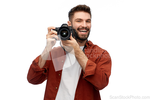 Image of smiling man or photographer with digital camera