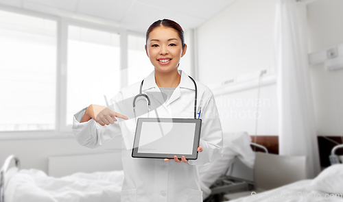 Image of asian female doctor with tablet pc at hospital