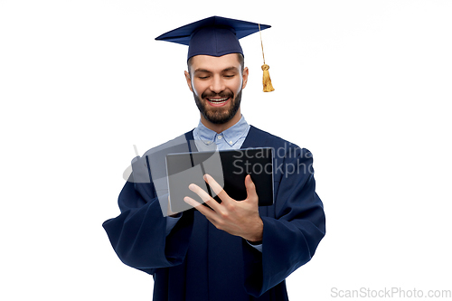 Image of male graduate student or bachelor with tablet pc