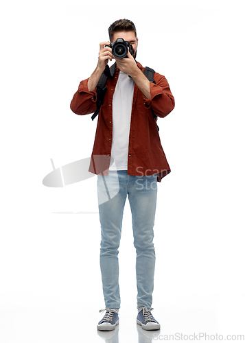 Image of smiling man or photographer with digital camera