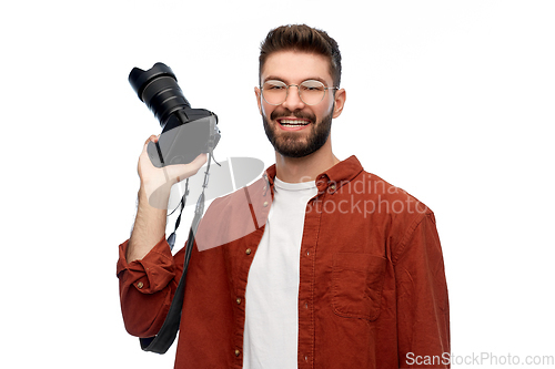 Image of smiling man or photographer with digital camera