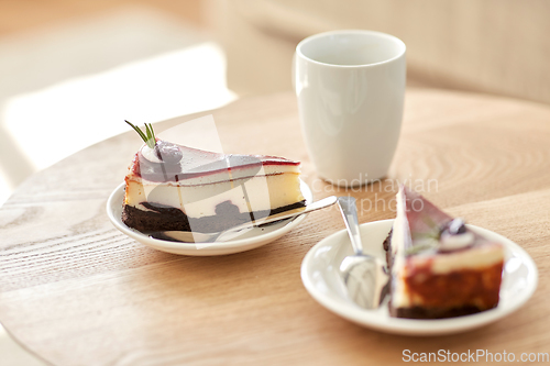 Image of piece of chocolate cake on wooden table