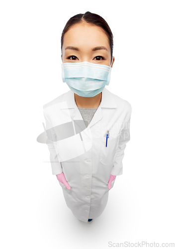 Image of asian female doctor in medical mask and gloves