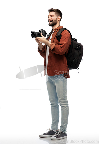 Image of happy man or photographer with camera and backpack