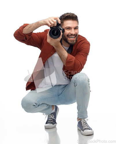 Image of smiling man or photographer with digital camera