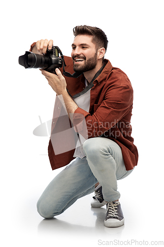 Image of smiling man or photographer with digital camera