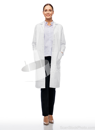 Image of smiling female doctor or scientist in white coat