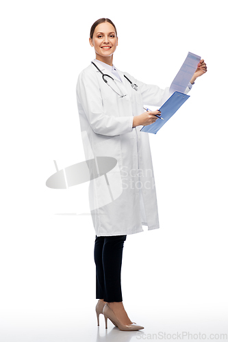 Image of happy smiling female doctor with clipboard