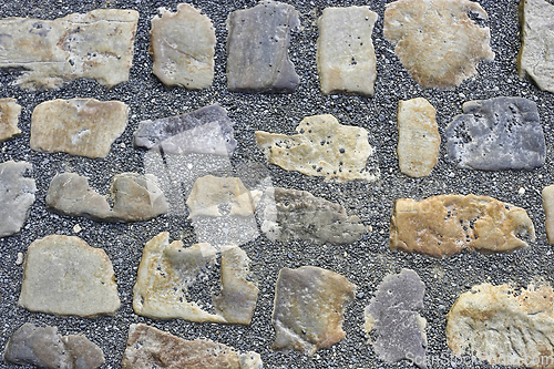 Image of Paving stones road with gravel