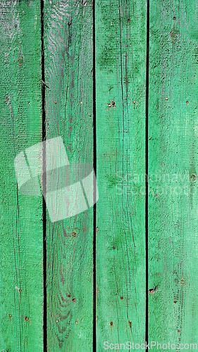 Image of Texture of weathered wooden green painted fence