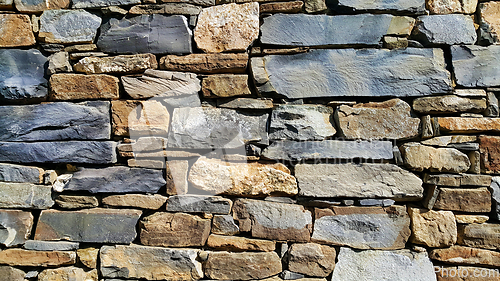 Image of Old wall from stones of various shapes