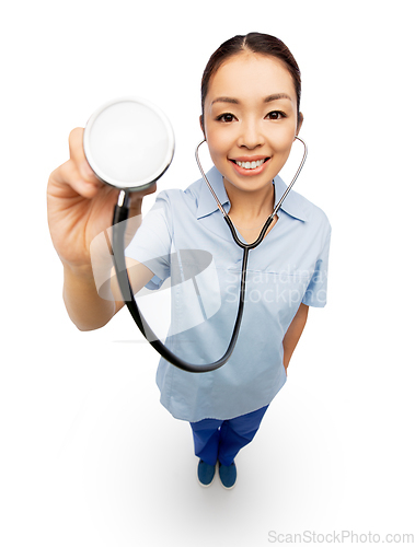 Image of happy smiling asian female doctor with stethoscope