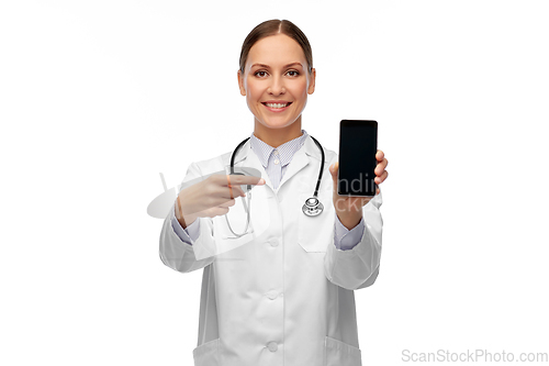 Image of happy female doctor or nurse with smartphone