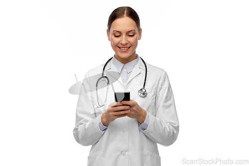 Image of happy smiling female doctor with smartphone