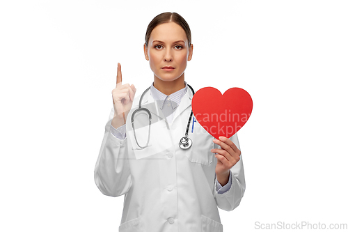 Image of female doctor with heart pointing finger up