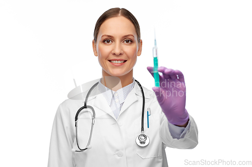 Image of happy female doctor with medicine in syringe