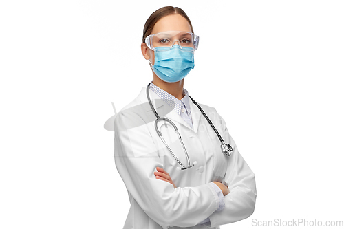 Image of female doctor in goggles and medical mask