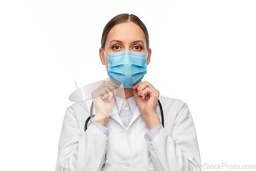 Image of happy female doctor wearing medical mask