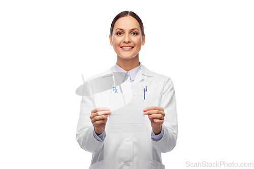 Image of smiling female doctor with prescription blank