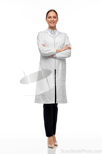 Image of smiling female doctor or scientist in white coat