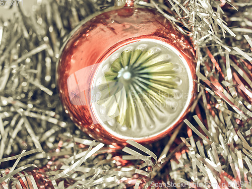Image of Vintage looking Christmas bauble and tinsel