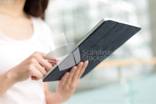 Image of Woman use of tablet pc