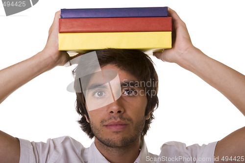 Image of young man with book