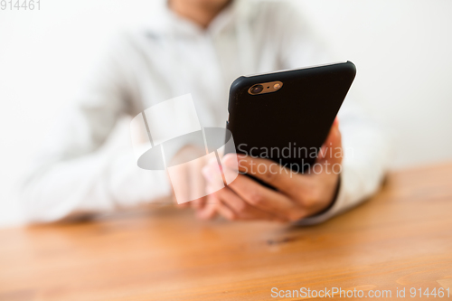 Image of Woman using mobile phone