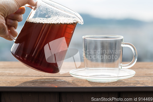 Image of Pouring coffee into a glass