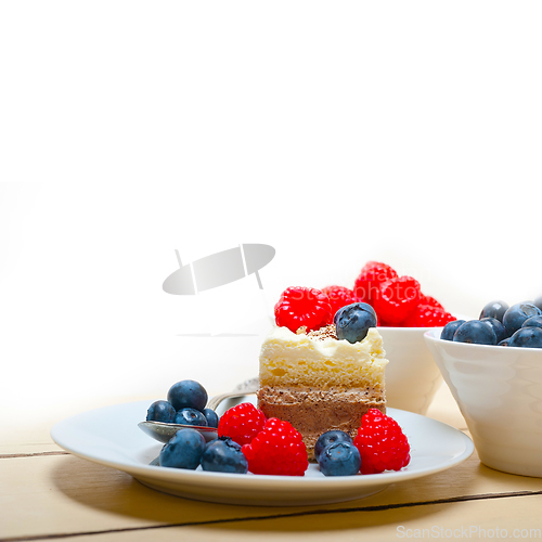 Image of fresh raspberry and blueberry cake