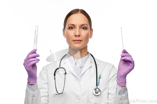 Image of female doctor with test tube and cotton swab