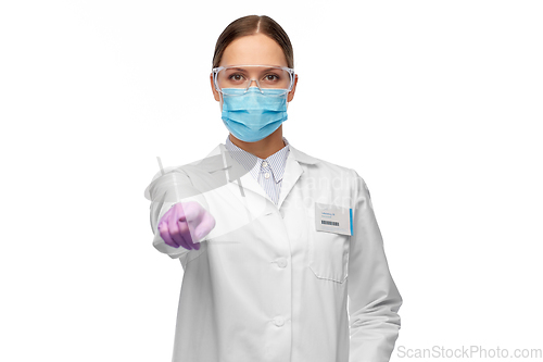 Image of female scientist in medical mask and goggles