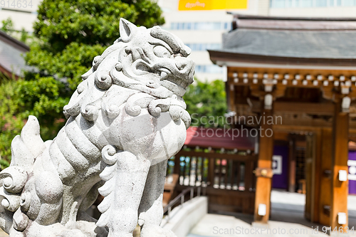 Image of Japanese temple and lion statue