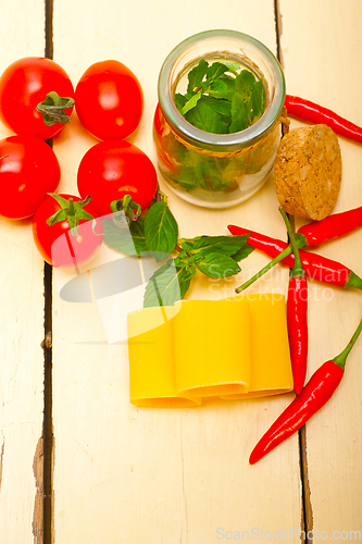 Image of Italian pasta paccheri with tomato mint and chili pepper