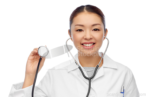 Image of happy smiling asian female doctor in white coat