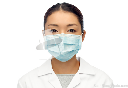 Image of asian female doctor in protective medical mask
