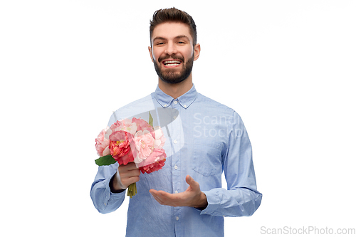 Image of happy smiling man with bunch of flowers