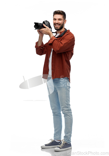 Image of smiling man or photographer with digital camera